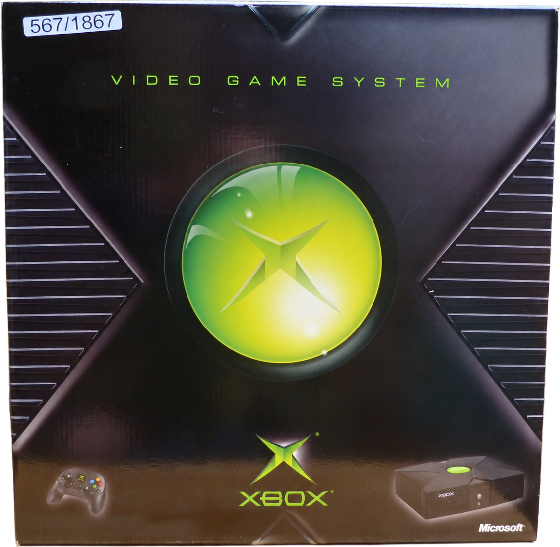 Original retail box for the Microsoft Xbox video game system, featuring the iconic green and black Xbox logo design, with a small white Microsoft logo in the bottom right corner.